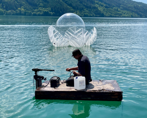 Installation of the large inflatable LOTUS sculpture on Lake Millstatt